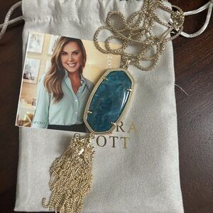 Kendra Scott Rayne Gold Long Pendant Necklace in Aqua Apatite.